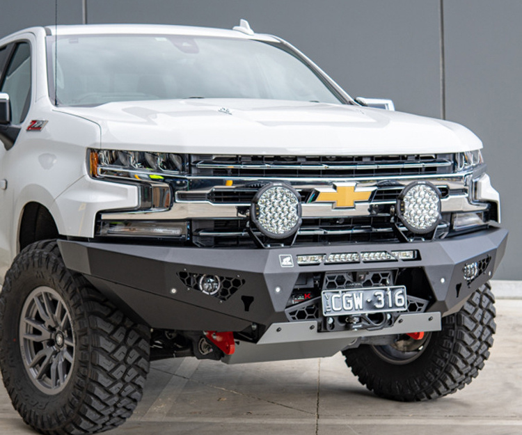 The front of the new Triton – which will replace Australia’s fourth most popular ute behind the Toyota HiLux, Ford Ranger and Isuzu D-MAX by early next year – is ruled by a chunky set of cheeks accentuated by tri-beam LED running lights and an array of lines, creases and contours.